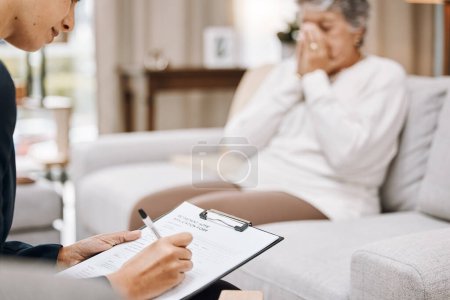 Photo for Psychologist, consulting or old woman crying in counseling with therapist writing notes in conversation. Stressed, checklist or psychology expert listening or helping sad senior person in therapy. - Royalty Free Image