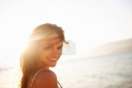 Photo for This is my happy place. Portrait of a beautiful young woman on the beach - Royalty Free Image