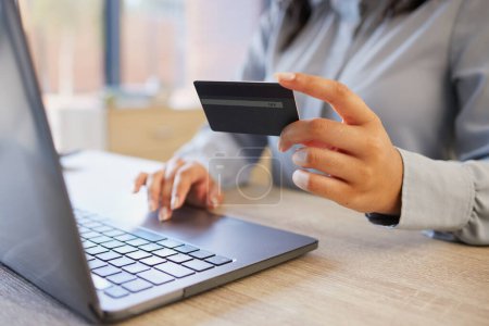 Foto de Credit card, laptop and finance with hands of woman for payment, online shopping and budget. Ecommerce, fintech and password with girl customer and banking for investment, website and internet. - Imagen libre de derechos