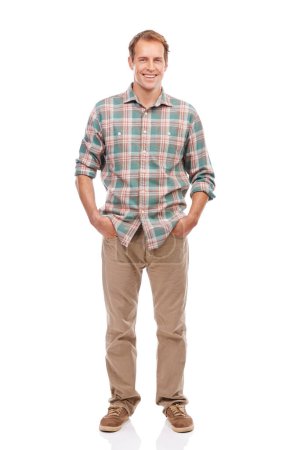 Photo for Stylish in plaid. Portrait of a handsome young man standing with his hands in his pockets against a white background - Royalty Free Image