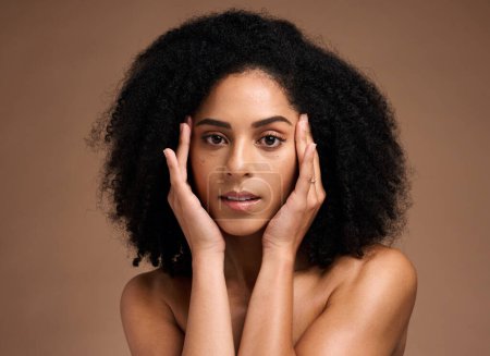 Téléchargez les photos : Skincare, afro and hair portrait of black woman with healthy aesthetic and natural texture. African grooming cosmetics model girl face with beautiful skin glow in brown studio background - en image libre de droit