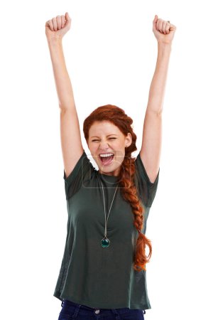 Téléchargez les photos : Oh, yeah. an attractive young woman celebrating a victory - en image libre de droit