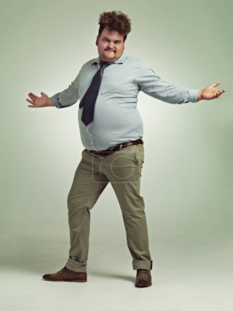 Photo for Want to dance. Full length shot of an overweight man with his arms outstretched - Royalty Free Image