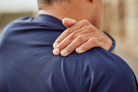 Photo for Fitness, back pain and man with hand on shoulder muscle for support, massage and relief during exercise or workout. Health, sports training and wellness and painful sports injury with hands on back - Royalty Free Image