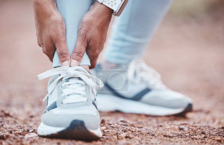 Photo for Foot injury, fitness accident and woman in nature with a body emergency, training pain and arthritis. Muscle problem, inflammation and feet of a runner with an injured ankle during outdoor cardio. - Royalty Free Image