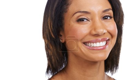 Téléchargez les photos : Happy, smile and portrait of black woman on a white background for cosmetics, healthy teeth and facial. Natural beauty, relax lifestyle and face of beautiful girl with big smile, makeup and confident. - en image libre de droit