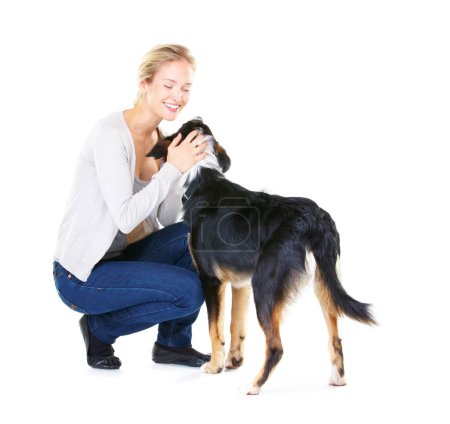 Téléchargez les photos : Love, pets and woman with dog and smile on white background with mockup and product placement. Best friends, happy woman and animal playing and training with pet care and loyalty together in studio - en image libre de droit