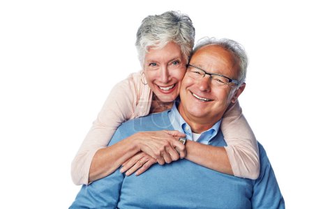 Love, senior and portrait of couple hug, smile and happy together against a studio white background. Relax, face and elderly man with woman embrace, holding and enjoy retirement, bond and isolated.