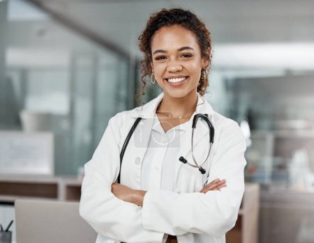 Confident in my medical ability. Cropped portrait of an attractive young female doctor standing with her arms folded in the office