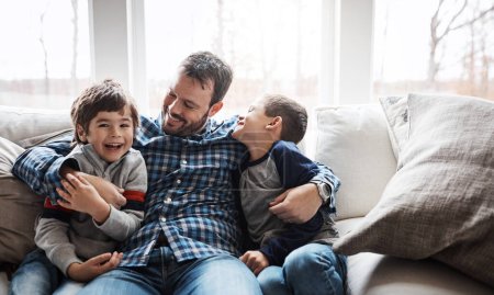 Hug, happy and portrait of father with children on the sofa for love, care and relax in family home. Smile, funny and dad with boy kids for quality time, affection and comedy on the couch of a house.