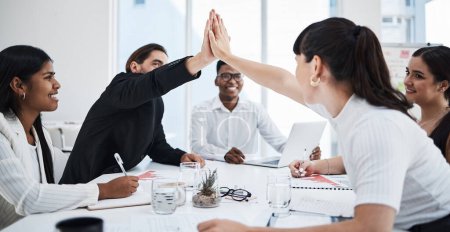 Photo for Business meeting, high five and teamwork success for target goals, report management and sales analysis in office. Team, hands celebrate and happiness for corporate achievement or growth motivation. - Royalty Free Image