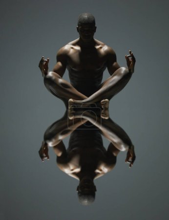 Black man, meditation and mirror reflection on dark background for spiritual wellness or symmetry. Portrait of a naked, nude or bare African American male model sitting and meditating doppelganger.