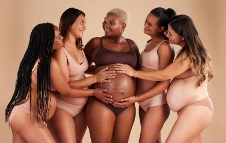 Photo for Happy women, hands or touching pregnant stomach of black woman on studio background in support, love or life insurance. Smile, bonding or friends in pregnancy underwear and feeling baby kick in belly. - Royalty Free Image