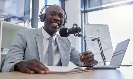 Photo for Portrait, microphone and man on laptop for radio, podcast or business influencer in studio, happy and excited. Face, talk show and host by black guy streaming creative, finance and live audience. - Royalty Free Image
