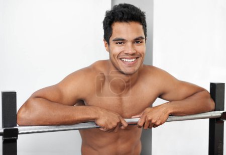 Photo for Ready for my workout. A fitness shot of an athletic young man - Royalty Free Image