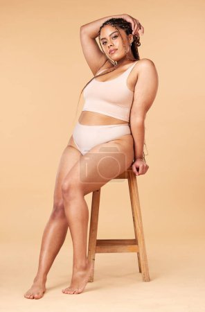 Photo for Woman in portrait with underwear, plus size and body positivity, fitness and beauty with skin isolated on studio background. Health, wellness and person with nutrition, cellulite and dermatology. - Royalty Free Image
