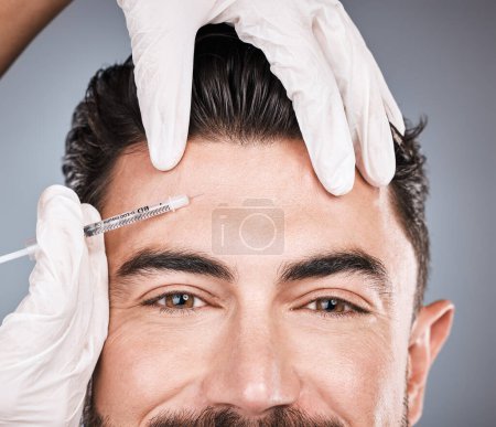 Photo for Forehead injection, man and portrait for skincare, beauty and botox aesthetic in studio. Plastic surgery, face cosmetics and guy change body with anti aging filler, facial salon and prp on background. - Royalty Free Image