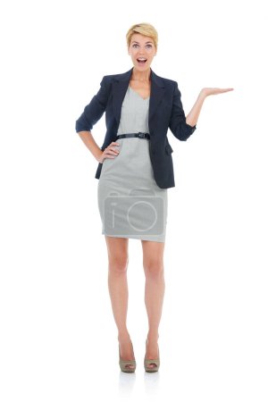 Photo for Introducing...Full-length shot of a young businesswoman isolated on white - Royalty Free Image