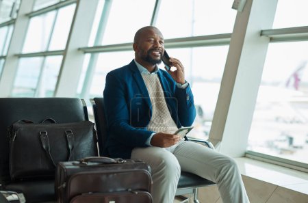 Photo for Black man, phone call and passport at airport for business travel, trip or communication waiting for flight. African American male with smile for conversation, schedule or plain times on smartphone. - Royalty Free Image