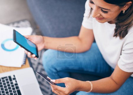 Foto de Ecommerce, phone or woman with credit card happy with digital payment while relaxing on sofa at home. Smile, finance or girl excited with online shopping subscription discount, sales offer or deal. - Imagen libre de derechos
