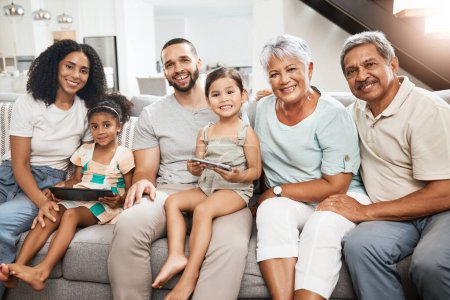 Foto de Big family, portrait smile and on living room sofa relaxing together for fun holiday break or weekend at home. Happy grandparents, parents and children smiling in happiness for bonding time on couch. - Imagen libre de derechos