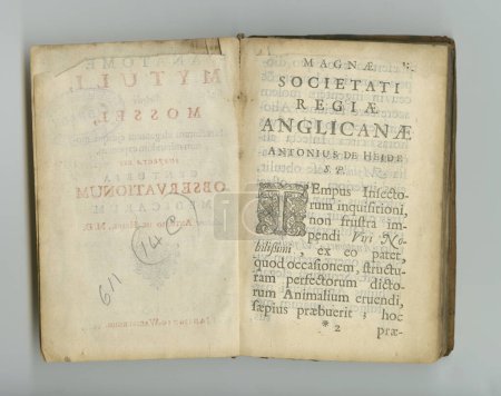 Foto de Old and weathered writing. An old medical book with its pages on display - Imagen libre de derechos