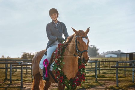 Téléchargez les photos : Winner, sports and portrait of woman on horse for a show, recreation and lessons on a farm. Equestrian, award and girl doing horseback riding for a competition, learning or training in countryside. - en image libre de droit