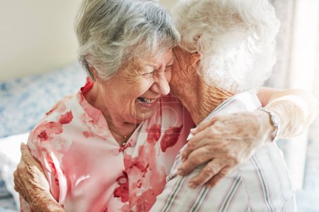Theres no love like a best friends love. two happy elderly women embracing each other at home