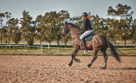 Téléchargez les photos : Woman, equestrian training and horse ride with mockup in nature on countryside grass field. Animal, young jockey and farm of a rider and athlete with mock up outdoor doing saddle sports with horses. - en image libre de droit