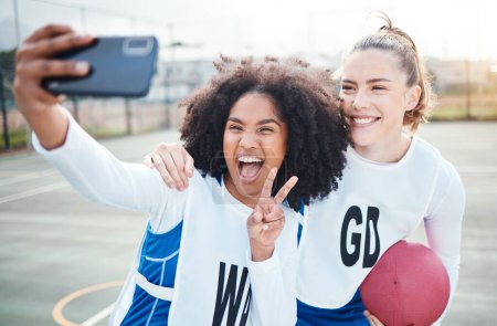 Black woman, friends and smile with peace sign for selfie, netball or social media post on the court. Happy sporty women smiling for profile picture, photo or vlog in memory for sports day together.