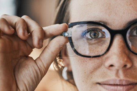 Portrait, eyes and woman with glasses for optical healthcare, prescription or perception. Female, face and spectacles of eye care, optometry and fashion frames for cosmetic beauty, lens choice or see.