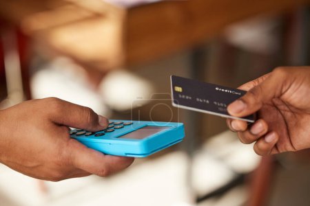Photo for Credit card, hands and payment on pos machine for fintech, banking or ecommerce. Digital technology, point of sales and man or customer buying, paying or tap on device for retail shopping or b2c - Royalty Free Image