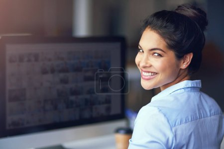 Photo for She has the right mindset for success. Portrait of a young businesswoman sitting at her office computer - Royalty Free Image