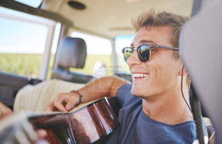Photo for Music, guitar and young man in car on a roadtrip adventure in nature. Summer, holiday and journey on the road, fun musician on vacation. Travel, freedom and explore nature with musical instrument. - Royalty Free Image