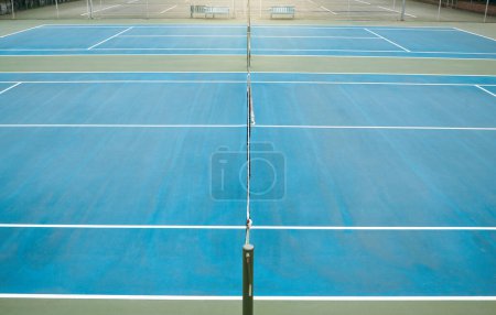 Photo for Empty tennis, court and sports space ready for exercise, training and game workout with mockup. Fitness, cardio and isolated sport match area for to play with a light at night and mock up area. - Royalty Free Image