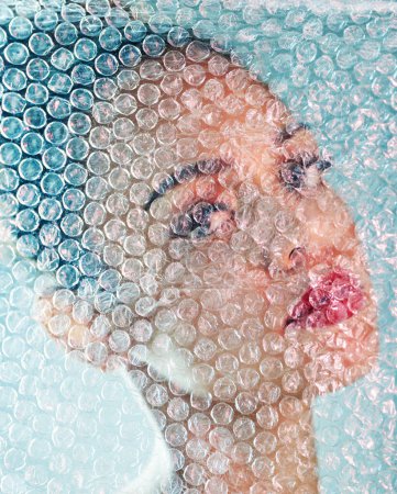 Photo for Beauty, bubble wrap and makeup with portrait of black woman for package, creative and cosmetics. Plastic, confidence and glow with girl model and red lipstick for facial, art and glow in studio. - Royalty Free Image