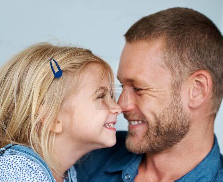 Photo for It takes someone special to be a dad. an adorable little girl rubbing noses with her father - Royalty Free Image