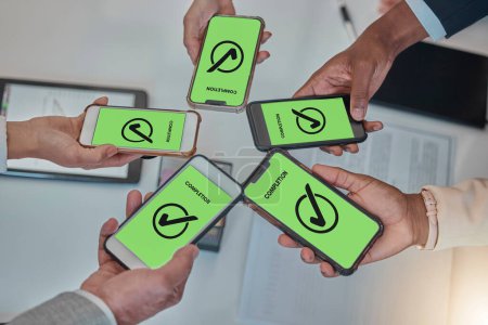 Photo for Business people, hands and phone with tick in networking, teamwork planning or sharing information. Hand of group above showing smartphone display in completion for tasks, mobile app or data syncing. - Royalty Free Image