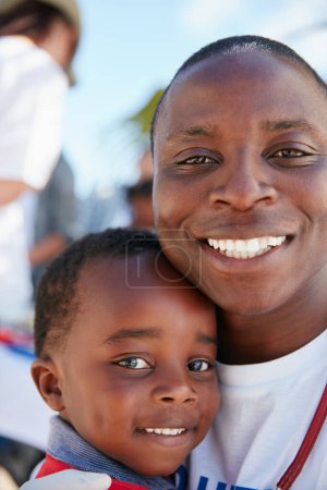 Photo for Our kids need lots of love and protection. Portrait of a caring volunteer doctor giving checkups to underprivileged kids - Royalty Free Image