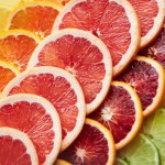Tickle your tastebuds with some tasty citrus. a variety of citrus fruits cut into slices