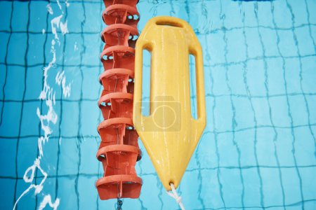 Photo for Above, water and a buoy in a pool for safety, life saving and floating help. Board, summer and equipment for protection, security and danger while swimming, rescuing and protecting from drowning. - Royalty Free Image