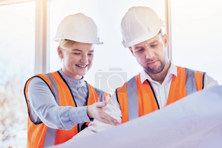 Photo for Architect, teamwork and planning with blueprint for construction, idea or site project at the office. Man and woman contractors in team strategy for building, floor plan or architecture at workplace. - Royalty Free Image