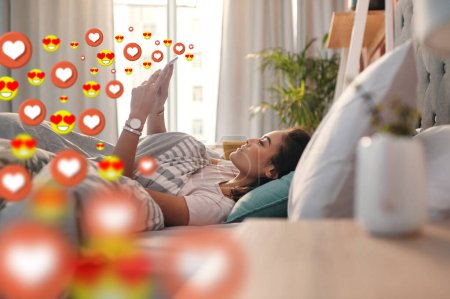 Photo for Bed, love icon or girl with a phone for communication, social media texting for online dating chatting. Morning, overlay or relaxed woman on mobile app website or digital network with heart emoticons. - Royalty Free Image