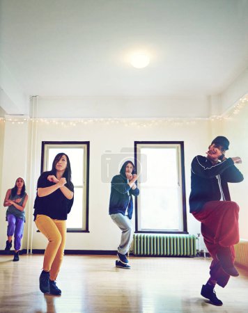Hip hop - Not something you do, something you are. a group of young people dancing together in a studio