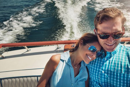 Photo for Its a day dedicated to love and relaxation. a young couple spending time together on a yacht - Royalty Free Image