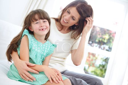 Photo for Theres no greater love. Portrait of a cute little girl spending time with her mother at home - Royalty Free Image