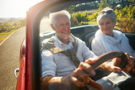 Photo for Off to a place we always wanted to go. a senior couple going on a road trip - Royalty Free Image