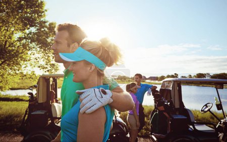 Photo for Pros at golf and in marriage. two couples playing a round of golf together on a sunny day - Royalty Free Image