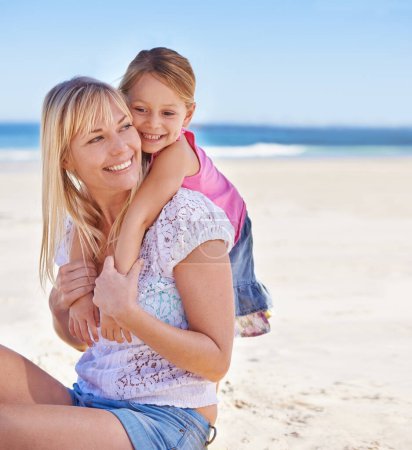 Photo for Mommys the best. a loving mother and her daughter sitting on the beach - Royalty Free Image