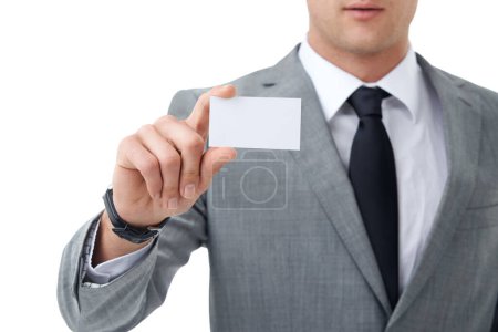 Photo for Introduce yourself. A businessman showing his blank business card - Royalty Free Image